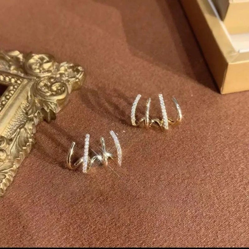 2 💎 ¡PRODUCTO ADICIONAL! 💎 ARETES DE CUATRO GARRAS 🌟