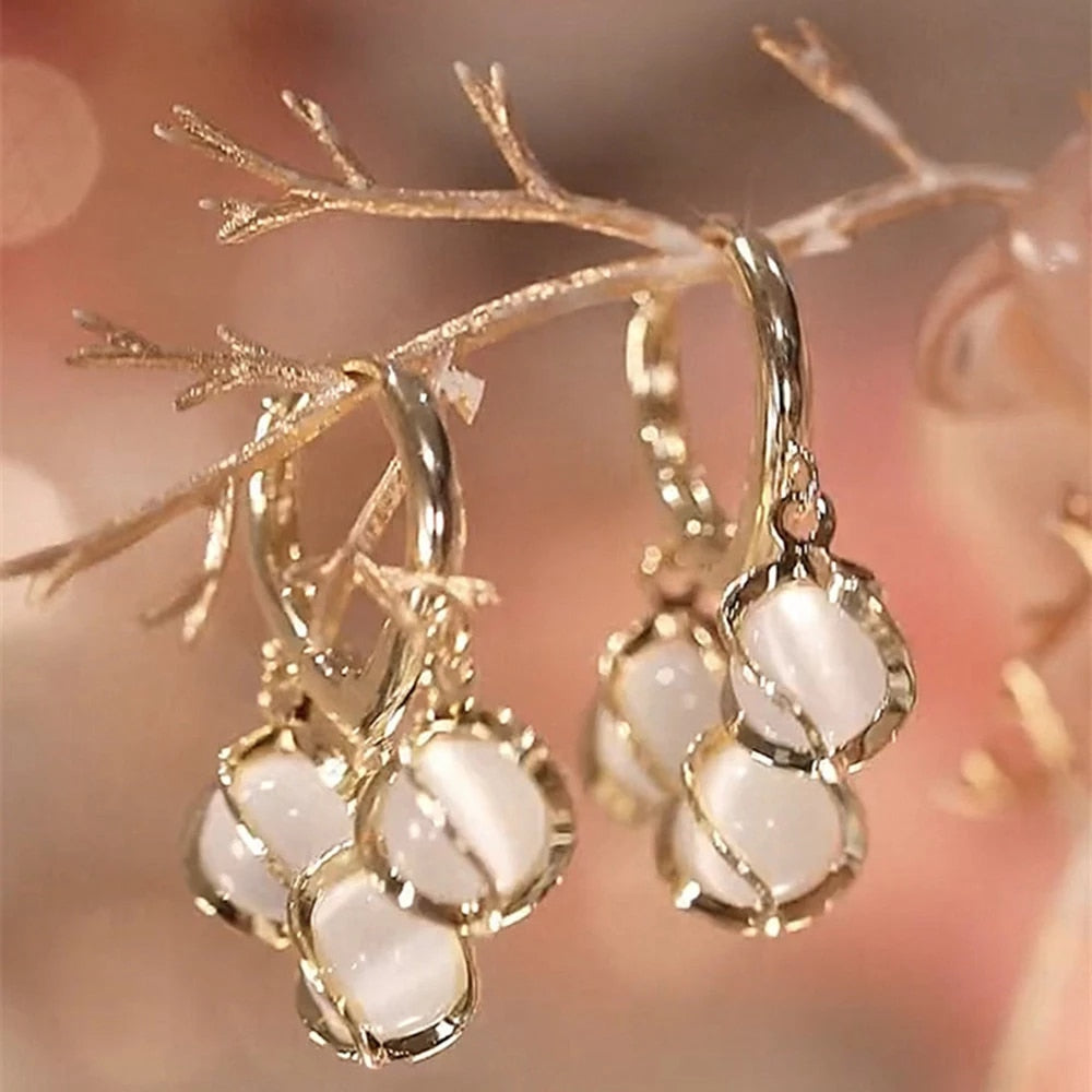 ADICIONAL ARETES ÓPALO
