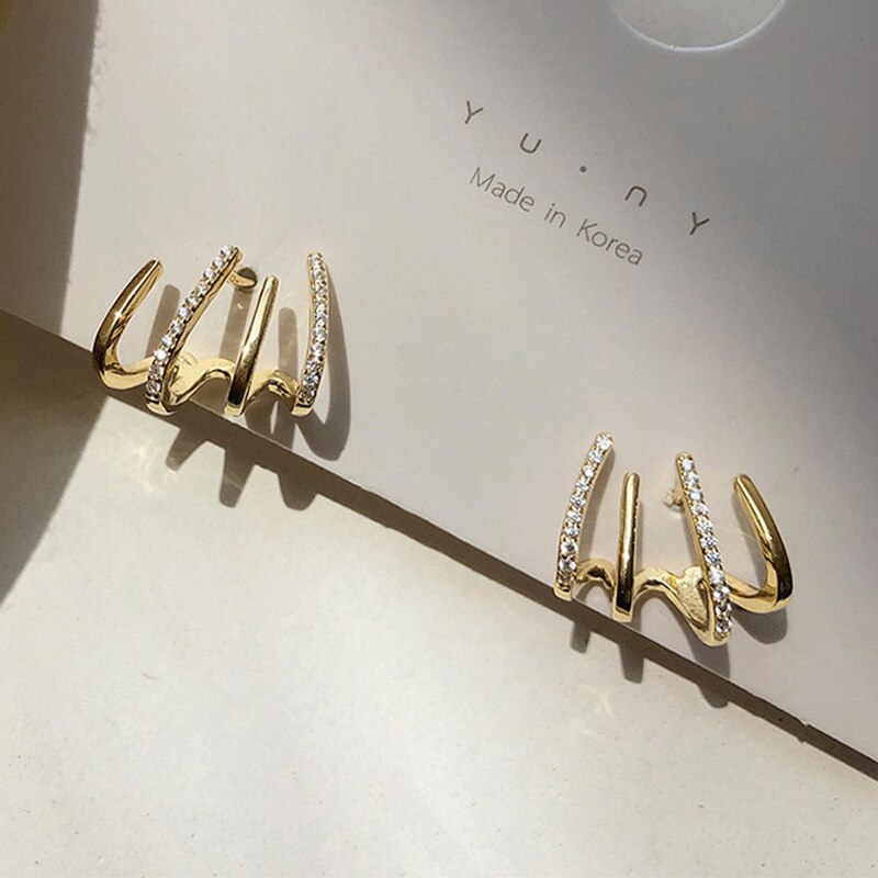 2 💎 ¡PRODUCTO ADICIONAL! 💎 ARETES DE CUATRO GARRAS 🌟